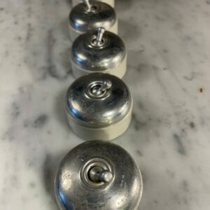 Vintage mid-century porcelain and chrome toggle light switch with industrial design from 1950s-1970s European homes
