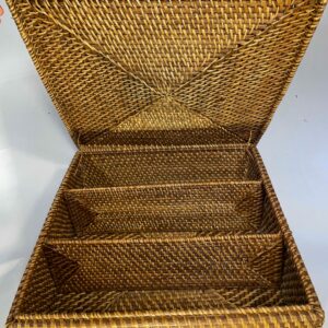 Vintage woven rattan storage box with multiple compartments and tight weave design in natural wicker tones