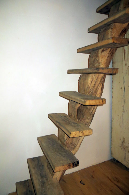 Custom handcrafted hardwood stairs made from reclaimed antique oak floor-beams by Studio B3KM