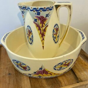 Vintage French Saint-Amand Art Deco pitcher and basin set with hand-painted orange and green floral pattern