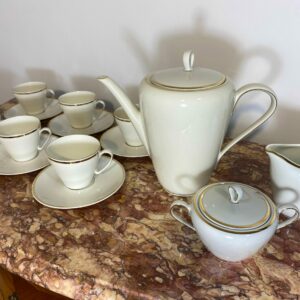 Vintage 9-piece Bavarian porcelain tea set with gilded trim and elegant floral design - mid-century German tableware collectible