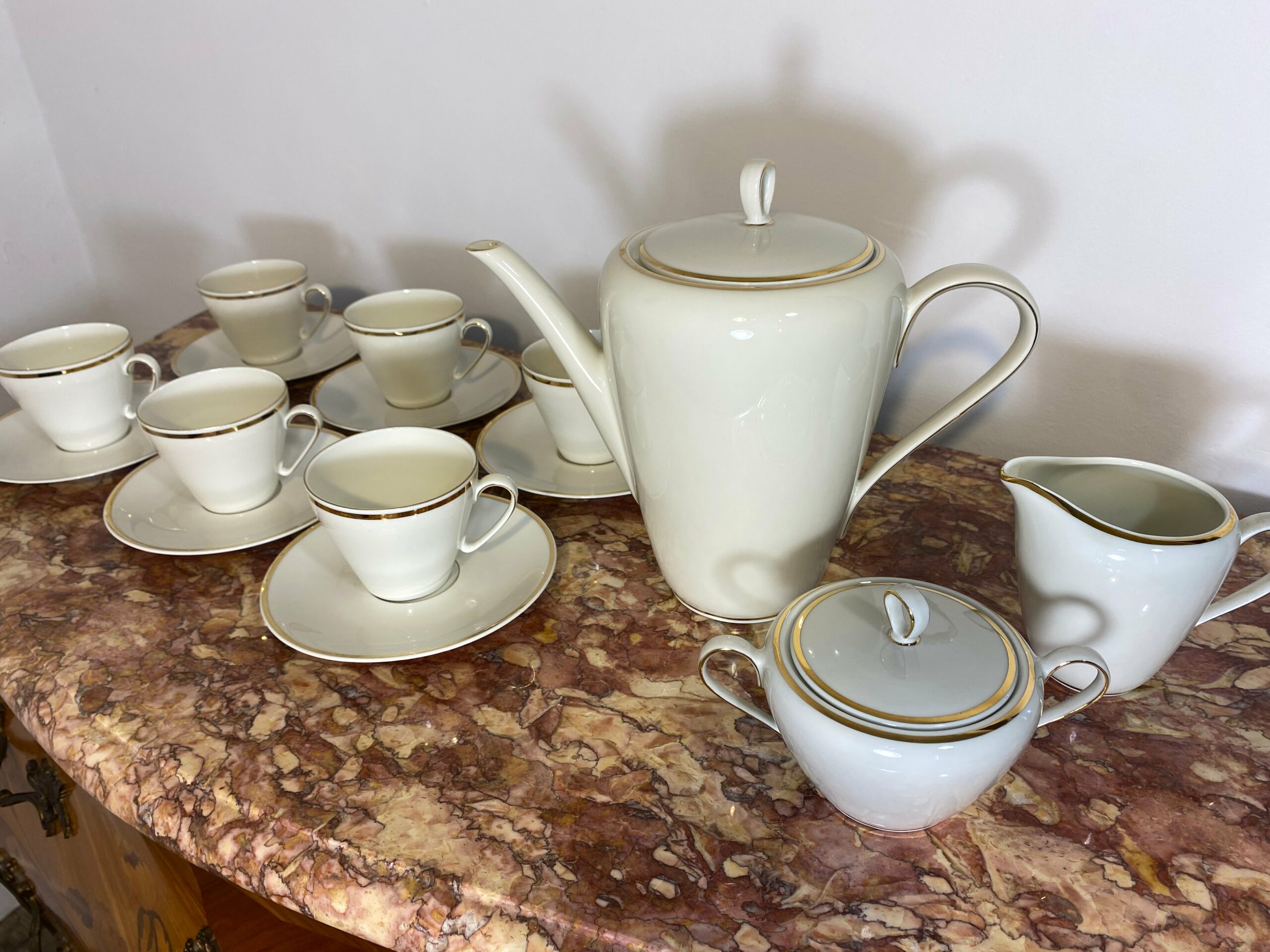 Vintage 9-piece Bavarian porcelain tea set with gilded trim and elegant floral design - mid-century German tableware collectible