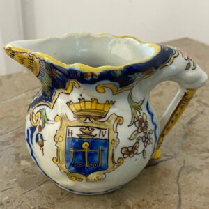Antique French faience pitcher from Les Sables d'Olonne with hand-painted polychrome florals and Henry IV crest - late 19th century ceramic