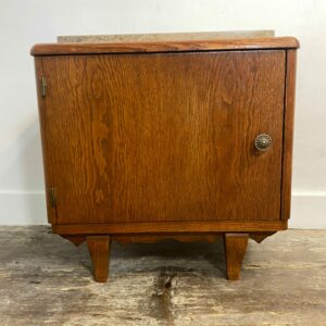 Mid-century modern wooden cabinet with beige marble top from 1950s - vintage rustic furniture with clean lines and scalloped apron