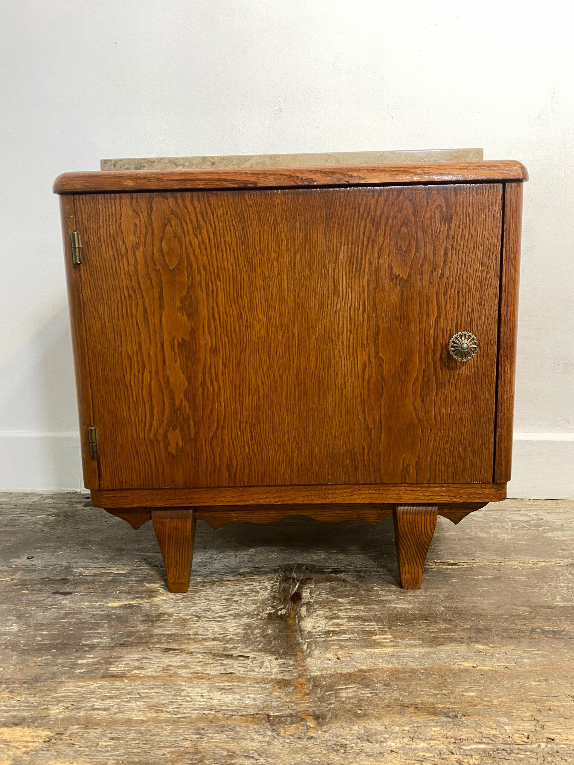 Mid-century modern wooden cabinet with beige marble top from 1950s - vintage rustic furniture with clean lines and scalloped apron
