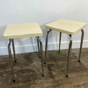 Pair of vintage mid-century modern stools with white Formica tops and chrome legs - retro industrial kitchen furniture