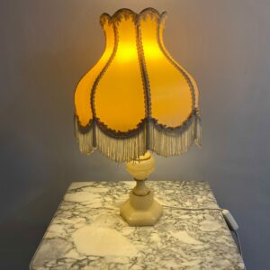 Vintage alabaster table lamp with Victorian Revival scalloped fabric shade, fringe trim, and Art Déco influences, made in France 1930s-40s