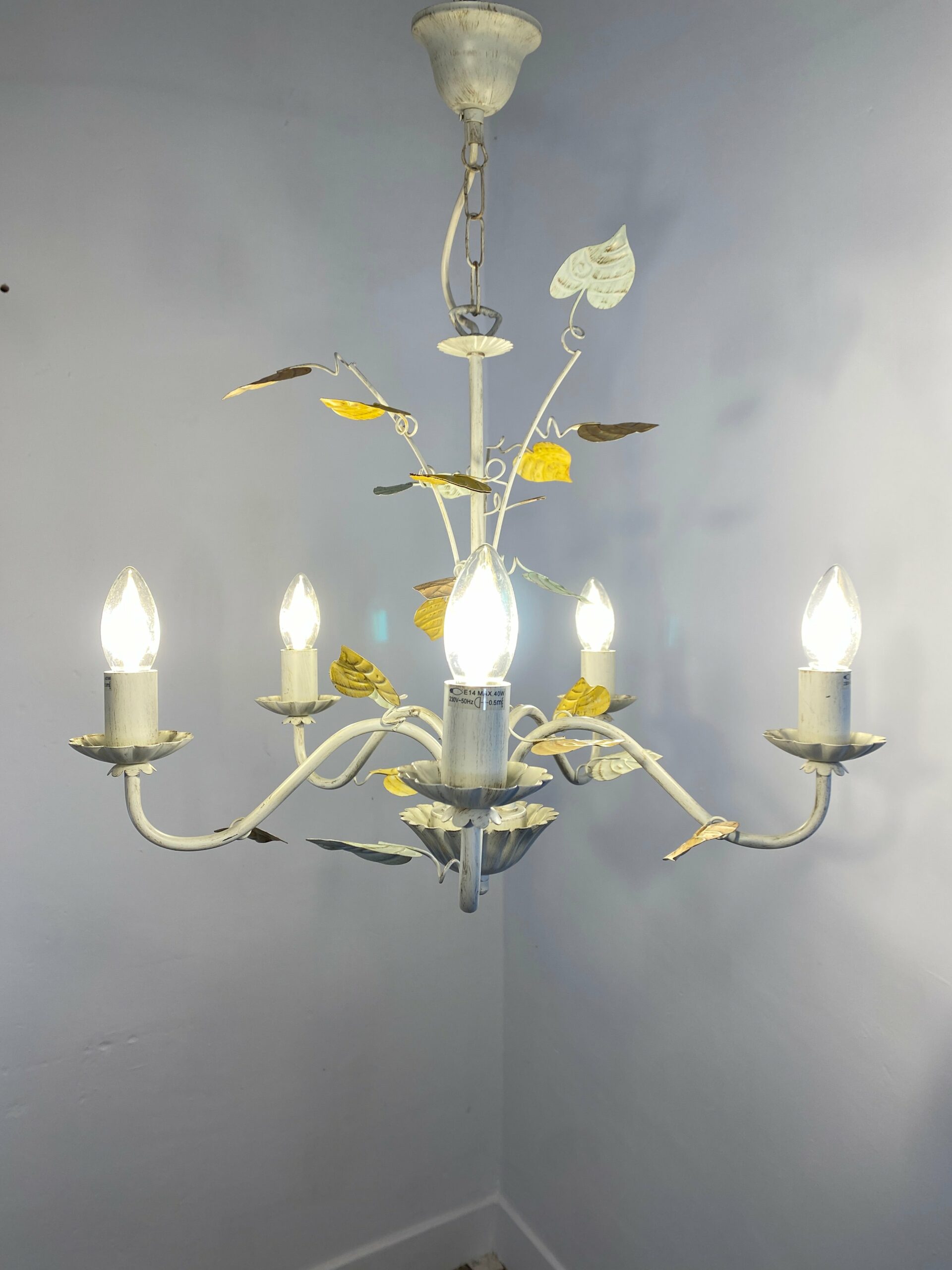 Vintage French toleware chandelier with 5 lights, hand-painted floral leaf design in pastel tones, shabby chic mid-century lighting